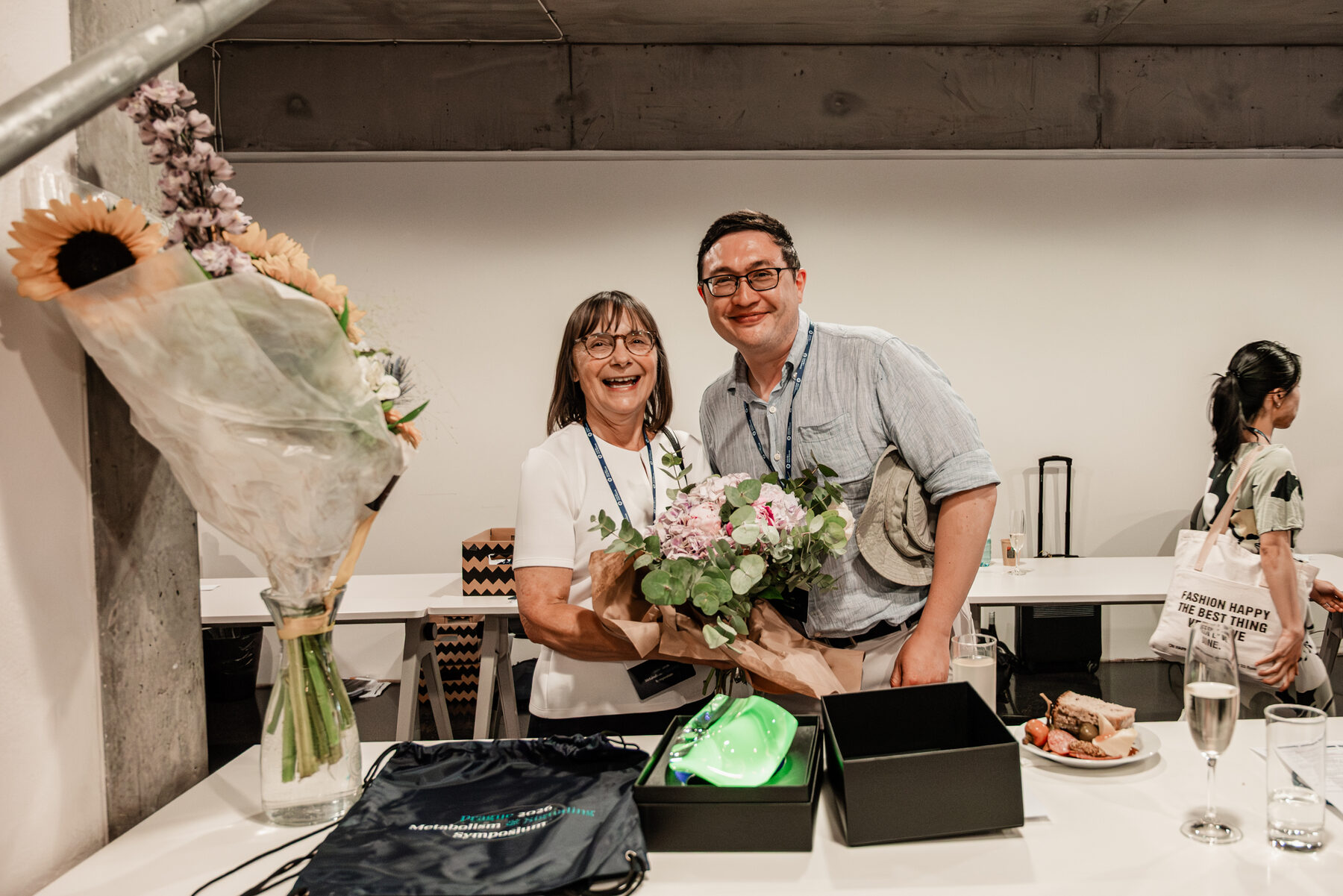 A thank-you moment with flowers for a speaker