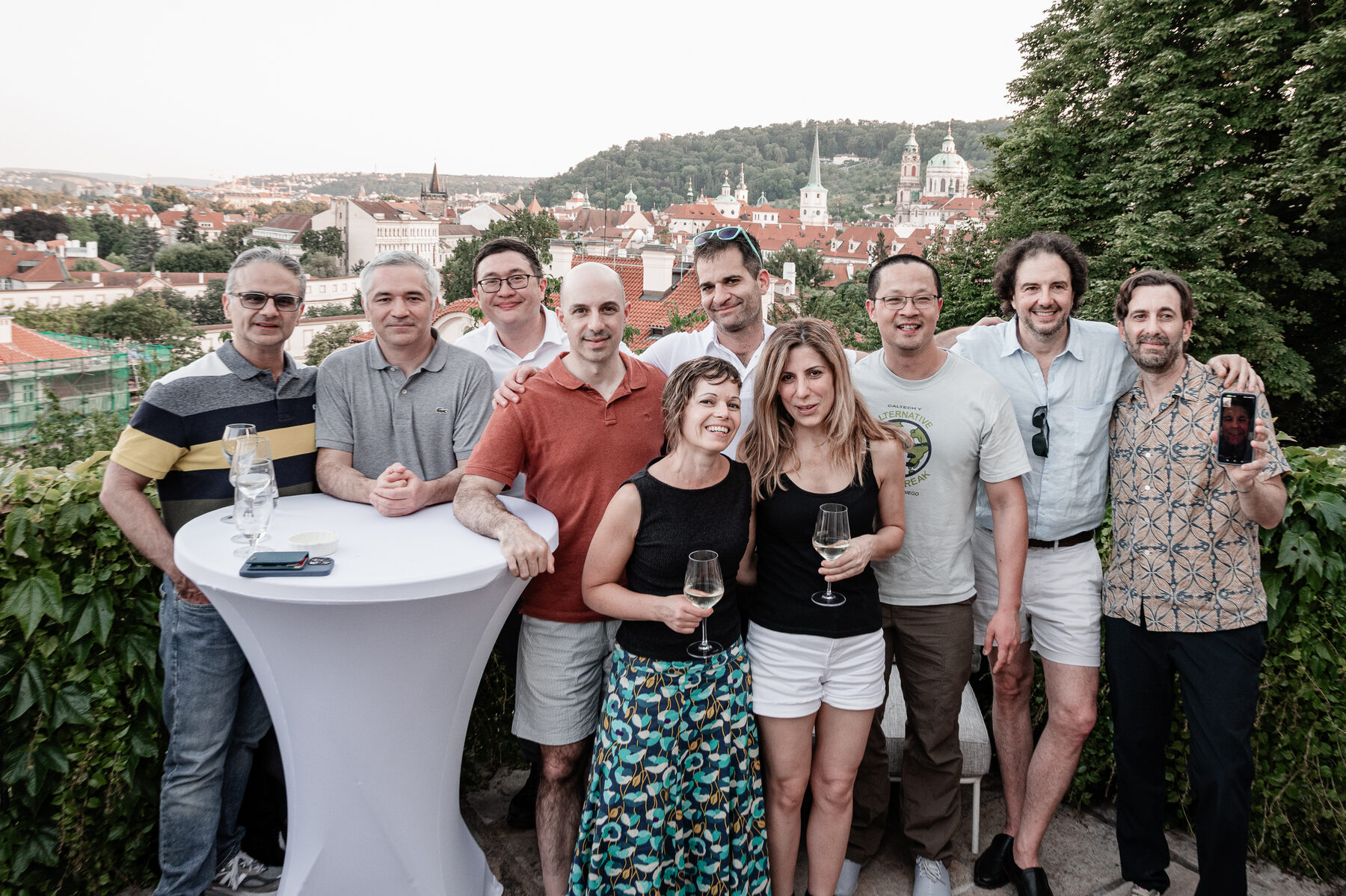 The team on a Prague terrace overlooking the city
